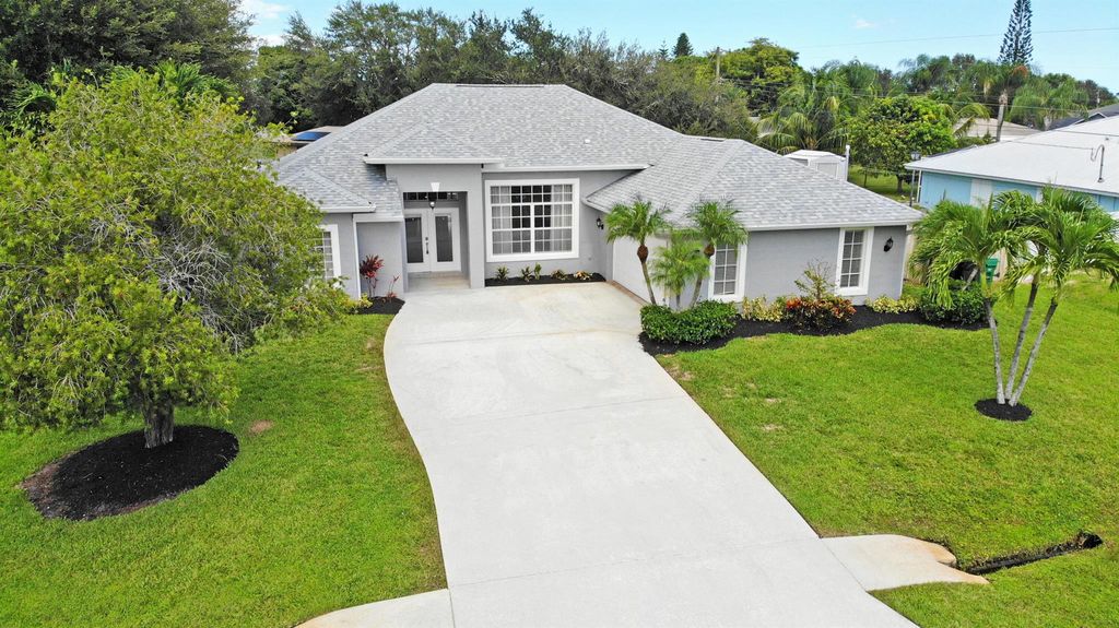 Photo of 2701 SE Brevard Avenue, Port Saint Lucie, FL 34952 (MLS # R11120204)