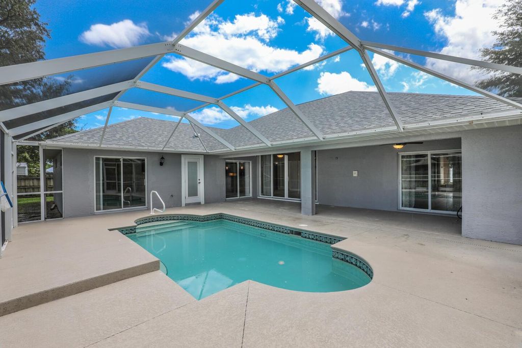 Photo of 2701 SE Brevard Avenue, Port Saint Lucie, FL 34952 (MLS # R11120204)