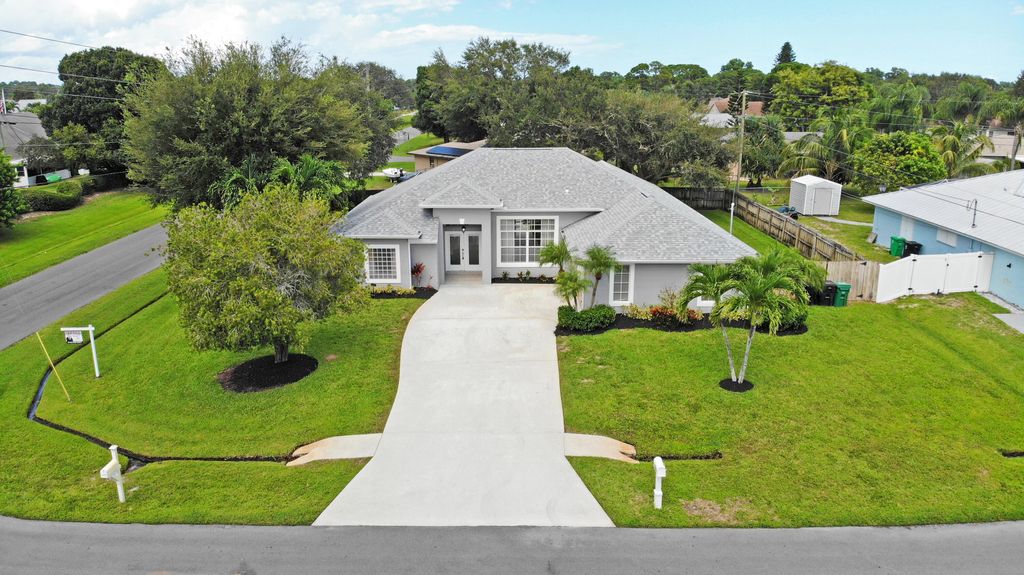 Photo of 2701 SE Brevard Avenue, Port Saint Lucie, FL 34952 (MLS # R11120204)