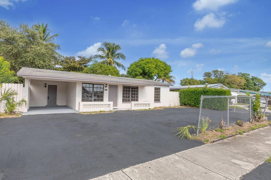 Move In for Less! Get 50% OFF Your First Month + Only Pay the Security Deposit to Move In! - Beautifully refreshed 3-bedroom single-family home located in a quiet Lauderhill neighborhood. Enjoy new paint throughout, a bright open layout, and a modern kitchen with new countertops and stainless steel appliances.This home features a dedicated laundry room, wide parking area for multiple vehicles, and a fully fenced yard--perfect for pets and outdoor relaxation.Save on move-in costs with our security deposit alternative! Instead of a large upfront deposit, pay a low monthly fee to move in quickly and affordably.This simple and fast process could save you the hassle and upfront
