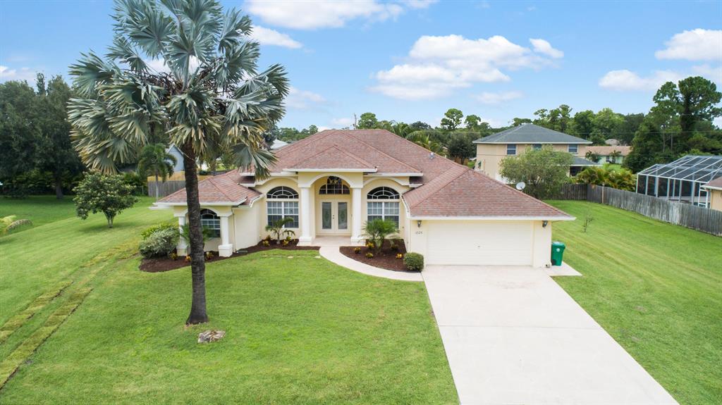 Photo of 1825 SW Kimberly Avenue Ave, Port St Lucie, FL 34953 (MLS # R10737050)