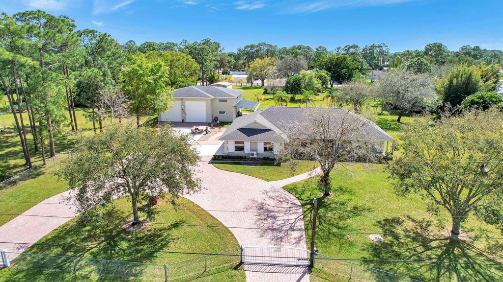 Photo of 14918 Tangleo Boulevard, West Palm Beach, FL 33412 (MLS # R10964002)