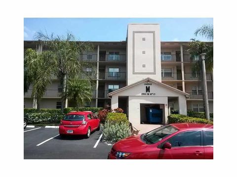 Photo of 12955 SW 16th Ct #M411, Pembroke Pines, FL 33027 (MLS # F10528503) Photo of 12955 SW 16th Ct #M411, Pembroke Pines, FL 33027 (MLS # F10528503)