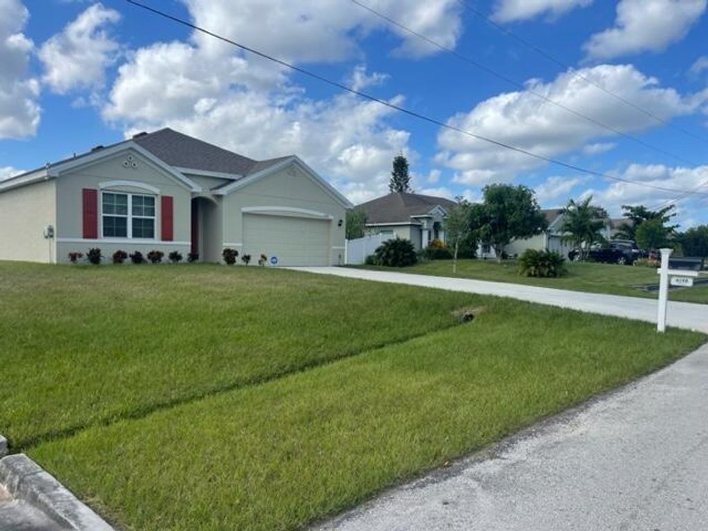 Photo of 4598 SW Tabor Street, Port Saint Lucie, FL 34953 (MLS # R10935947)
