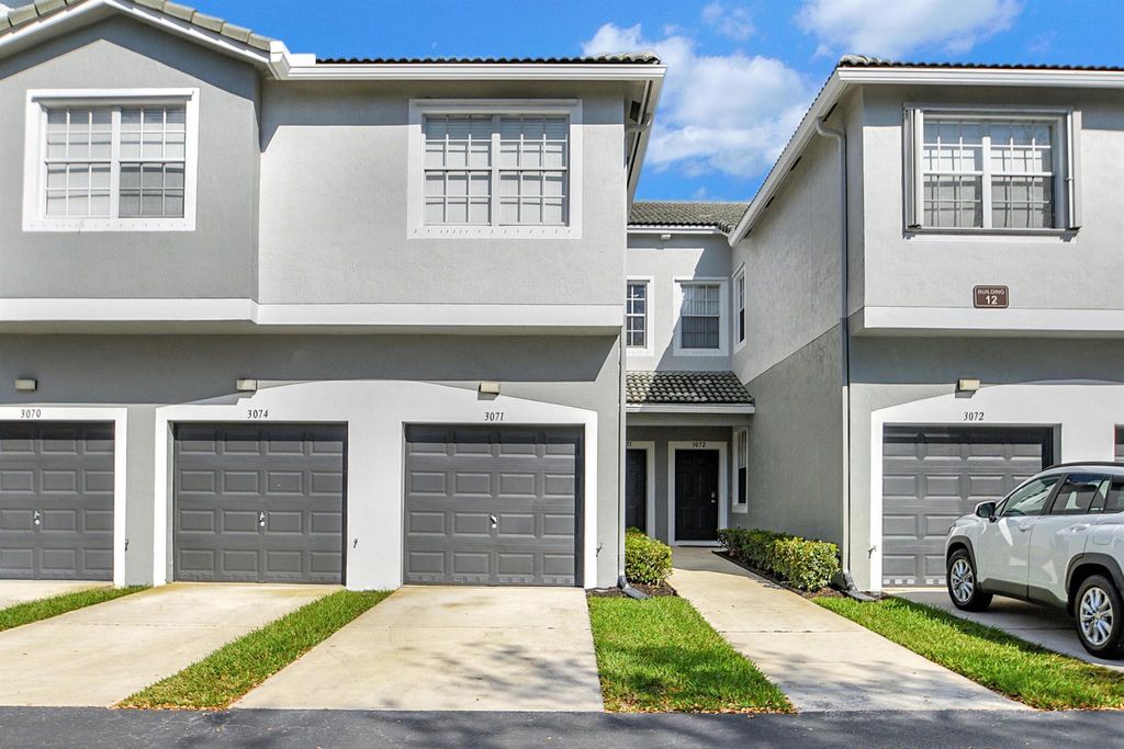 Photo of 3071 Grandiflora Drive, Greenacres, FL 33467 (MLS # R10956617)