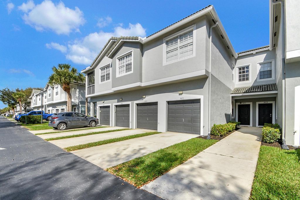 Photo of 3071 Grandiflora Drive, Greenacres, FL 33467 (MLS # R10956617)