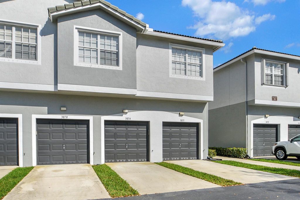 Photo of 3071 Grandiflora Drive, Greenacres, FL 33467 (MLS # R10956617)