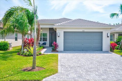 Photo of 13348 SW River Rock Road, Port Saint Lucie, FL 34987 (MLS # B26011987)
