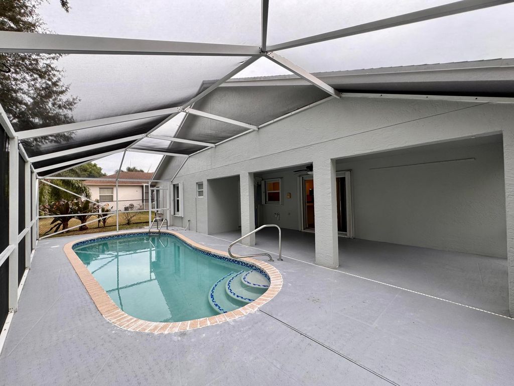 Photo of 1132 Hatteras Circle, Greenacres, FL 33413 (MLS # R11038931)