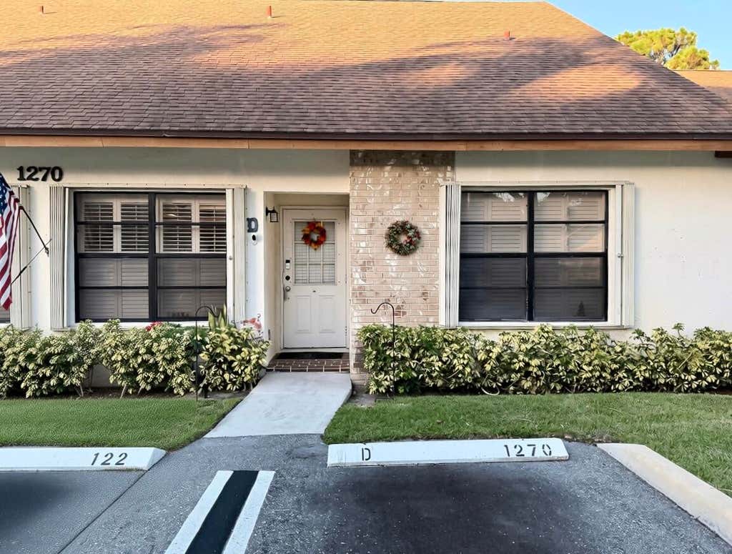 Photo of 1270 PARKSIDE GREEN Drive #D, Greenacres, FL 33415 (MLS # B26063231)
