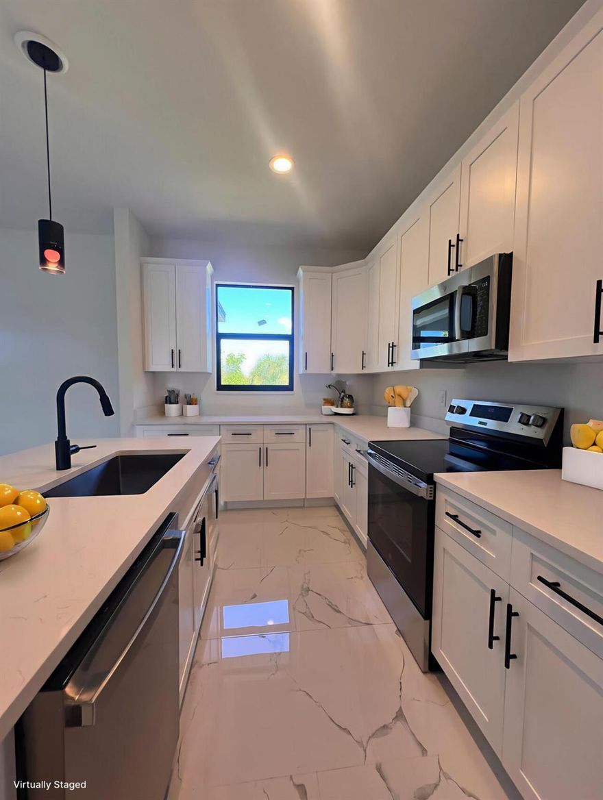 Brand New Construction. Amazing  3 bedrooms 2 bath Single Family Home.  Impact windows and doors. Wood kitchen cabinetry with quartz counter tops, stainless steel appliances. Large living area includes a cozy living room, dining area, and kitchen. Car garage with automatic door-opener. Covered Lanai.  Split bedroom plan.