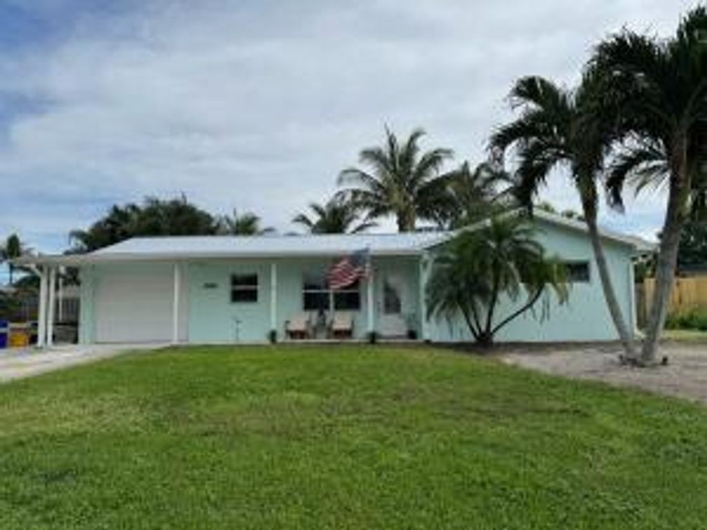 Photo of 1507 Venus Avenue, Jupiter, FL 33469 (MLS # R10991452)