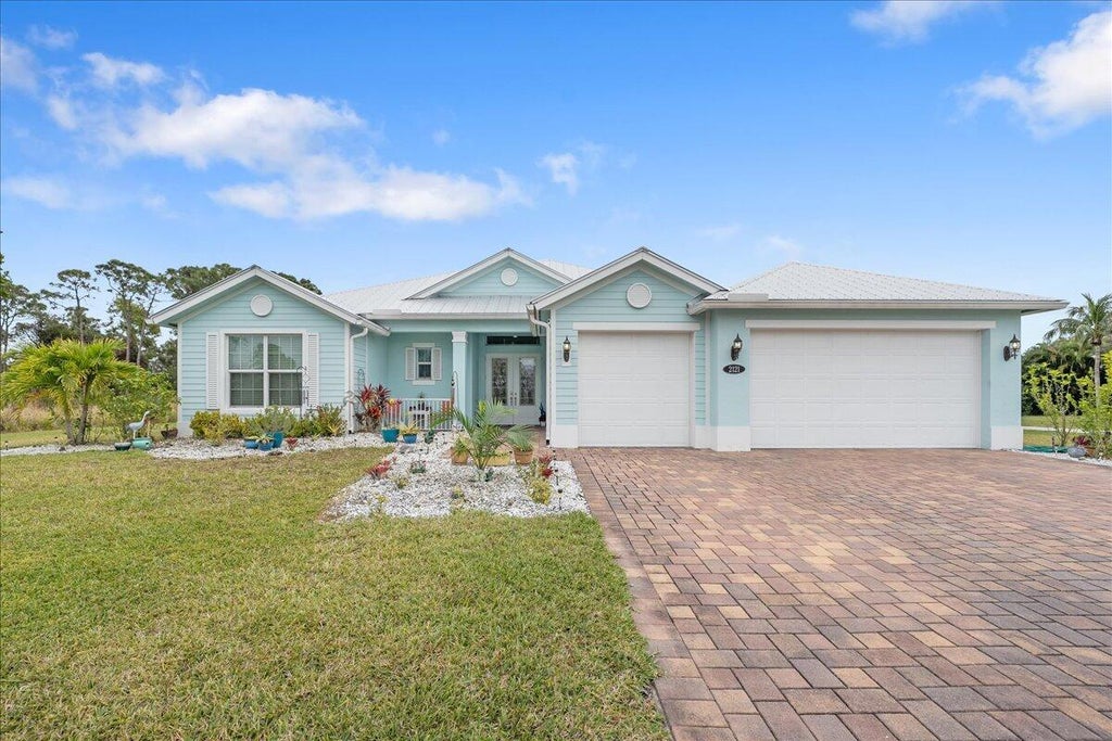 Photo of 2121 SE Gidding Road, Port Saint Lucie, FL 34952 (MLS # R11052126)