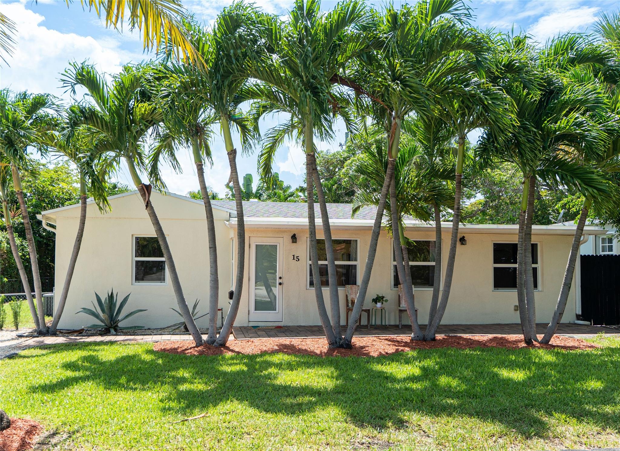 Upon entering, you are drawn to large windows & glass doors overlooking a tropical paradise pool area in the backyard. This renovated home is the perfect balance of contemporary & beachy old Florida charm. Quartz counters, white cabinetry & upper shelving in the kitchen and the bathrooms have a modern beachy feel. A bright & uplifting space perfect for entertaining indoors & out. 2 large primary suites. BRAND NEW ROOF 7/25, NEW FLAT ROOF 7/22, H2O Heater 2021, IMPACT windows & doors. The private backyard is fenced in. Live close to the beach & even closer to tons of dining, golf course, dog park, pickleball, playground, amphitheathre, grocery stores, monthly events, green market & all that Pompano Beach has to offer! Invest in thriving Pompano today, South Fla's fastest growing market.
