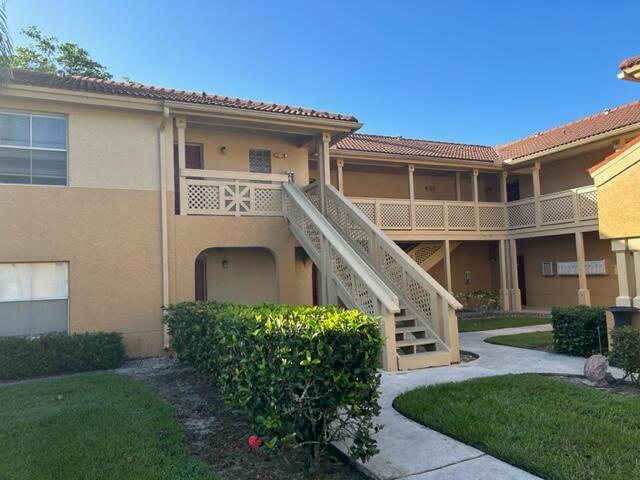Quaint two bedroom, two bath unit in the gated community of Palm Lake! Laminate and tile throughout, freshly painted, second floor unit with a small balcony! Nice kitchen with stainless steel appliances. Spacious bedrooms and plenty of storage! Washer and dryer in the unit. Ready for a new occupant! Great place to call home in a great community close to restaurants, shopping, parks, and more!