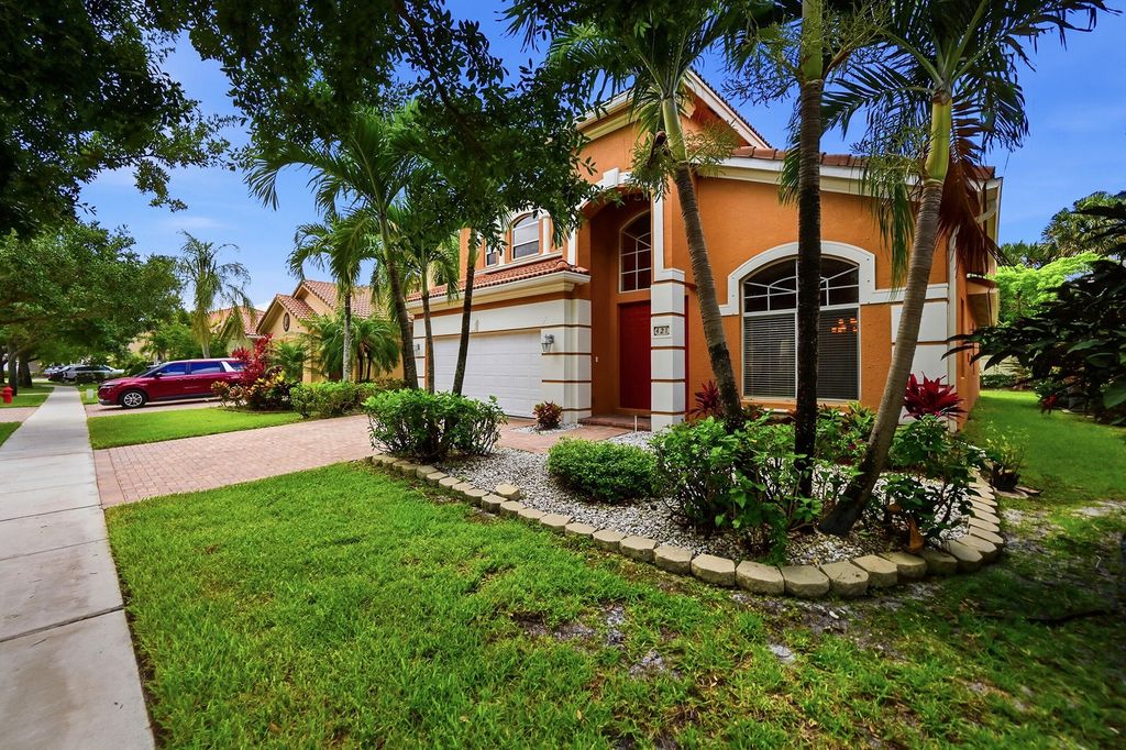 Photo of 421 Gazetta Way, West Palm Beach, FL 33413 (MLS # B26035486)
