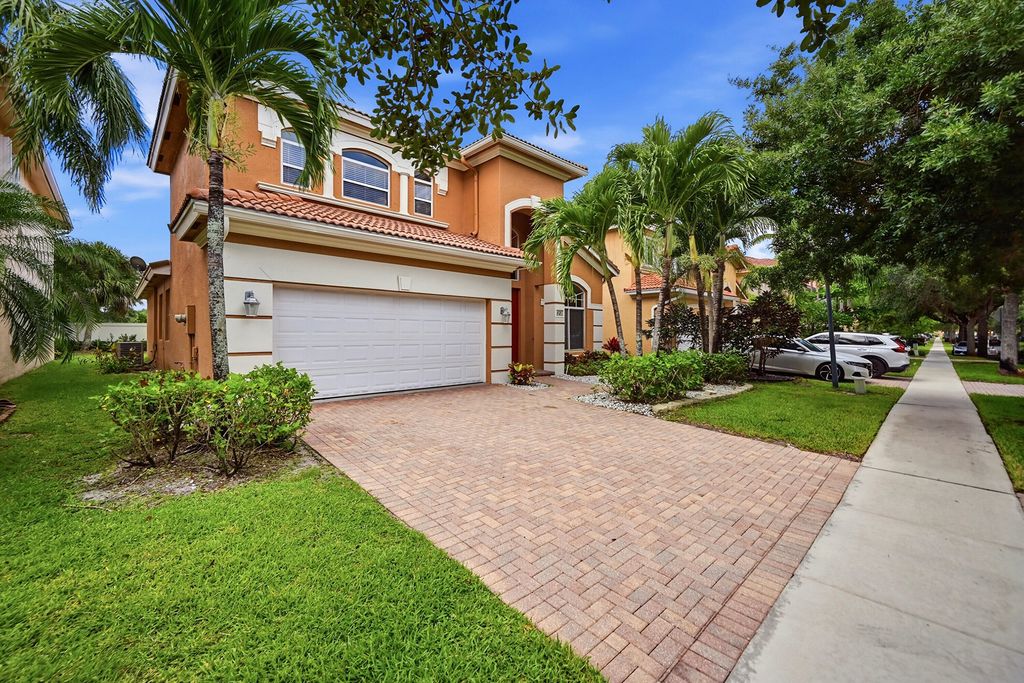 Photo of 421 Gazetta Way, West Palm Beach, FL 33413 (MLS # B26035486)