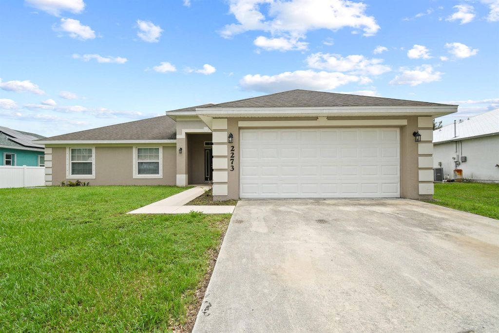 Photo of 2273 SW Monterrey Lane, Port Saint Lucie, FL 34953 (MLS # R11097288)