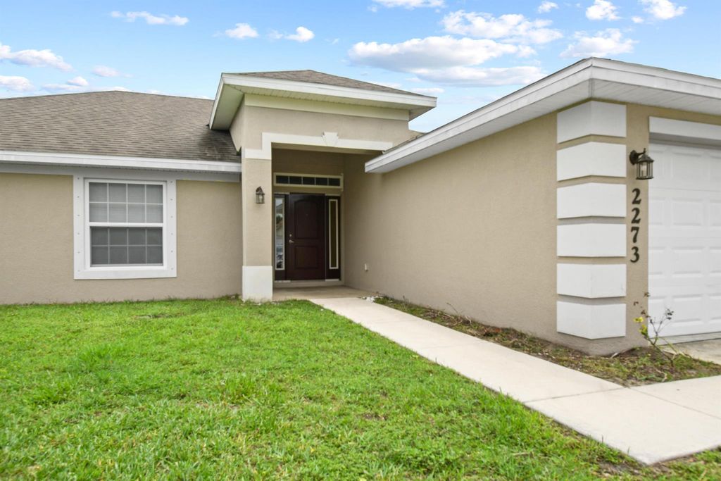 Photo of 2273 SW Monterrey Lane, Port Saint Lucie, FL 34953 (MLS # R11097288)