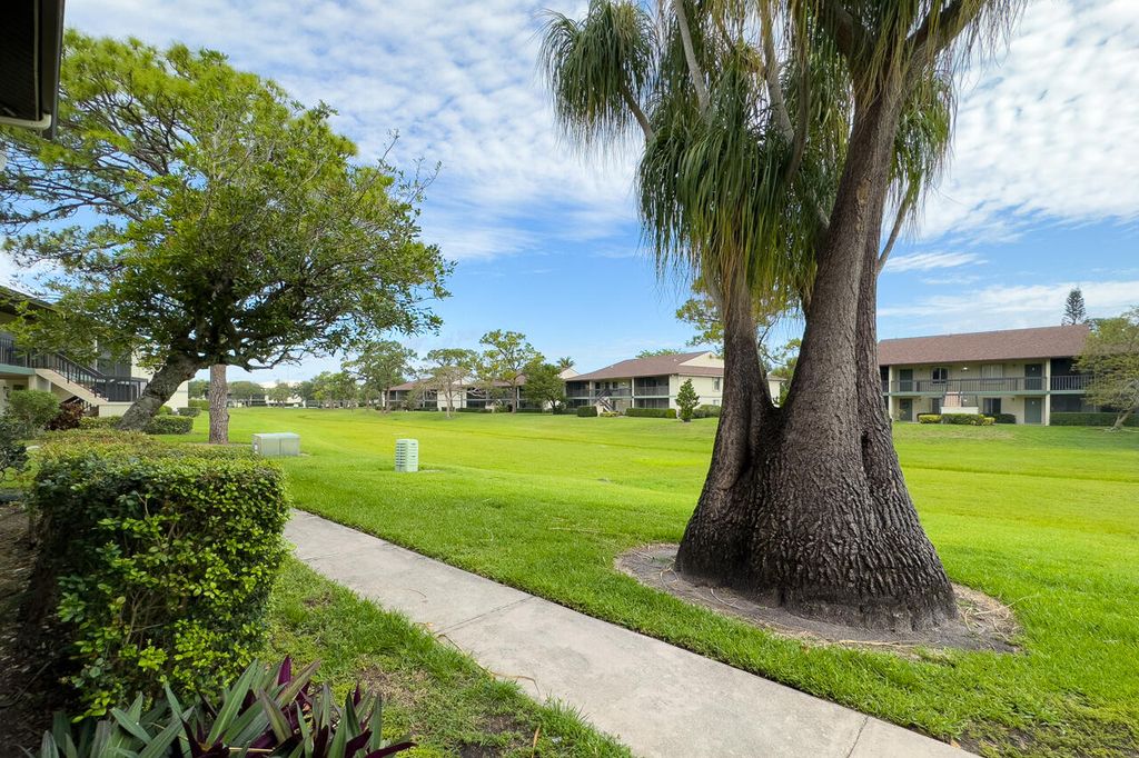 Photo of 6299 Chasewood Drive #D, Jupiter, FL 33458 (MLS # R11019404)