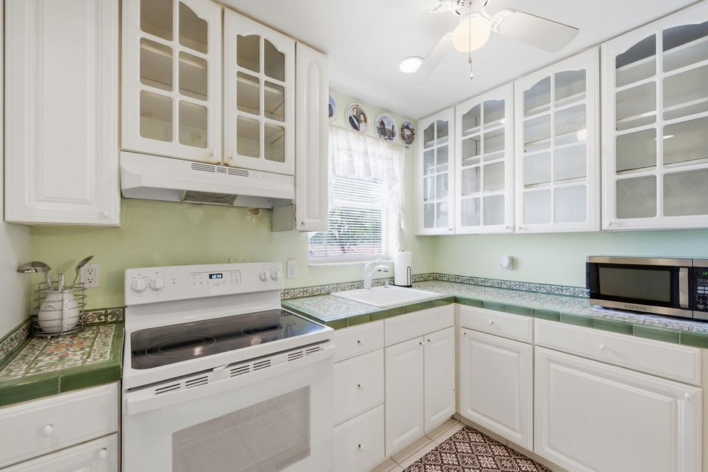 Photo of 112 Lake Anne Drive, West Palm Beach, FL 33411 (MLS # B26017026)