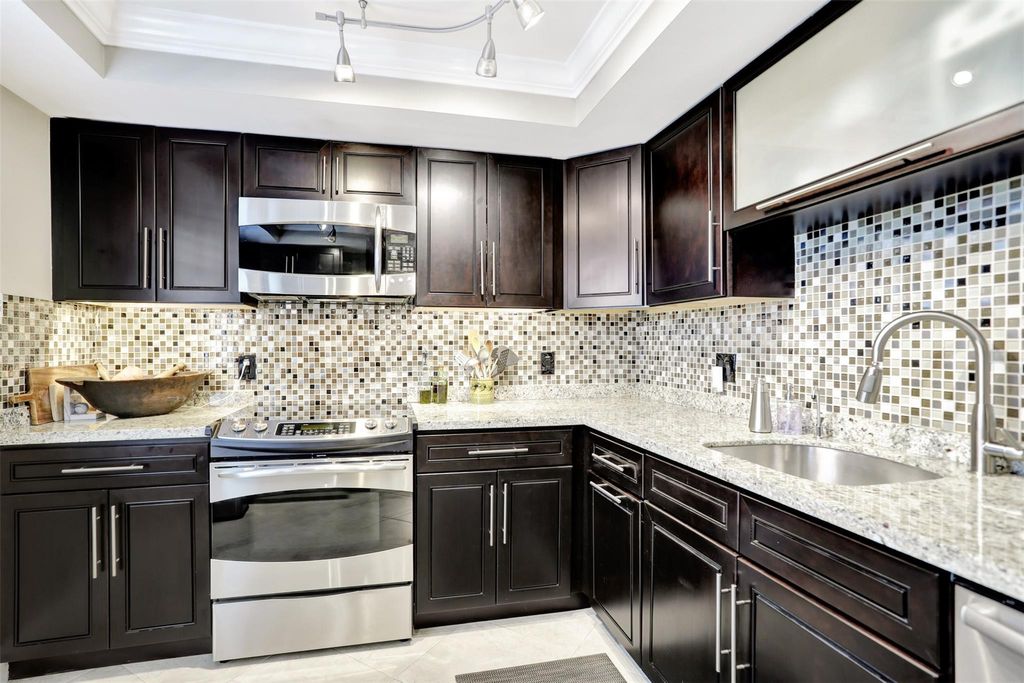 Photo of 555 Oaks Lane #503, Pompano Beach, FL 33069 (MLS # F10424630)