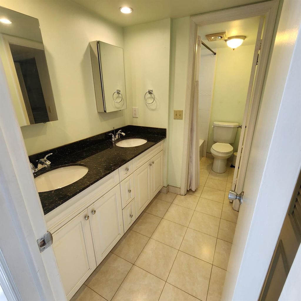 Photo of 9430 Poinciana Place #305, Davie, FL 33324 (MLS # F10549502)