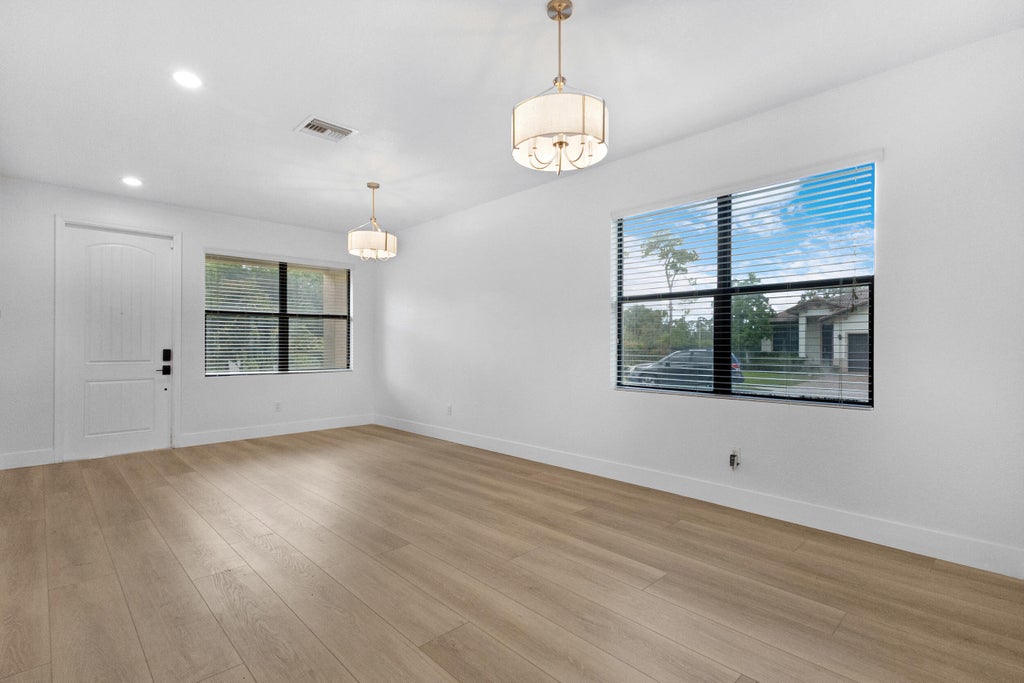Photo of 4846 Pond Pine Way, Greenacres, FL 33463 (MLS # B26051173)