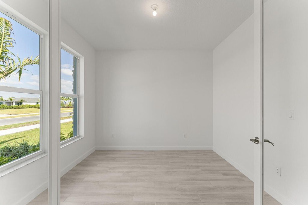 Photo of 13445 SW Bally Drive, Port Saint Lucie, FL 34987 (MLS # R11089990)