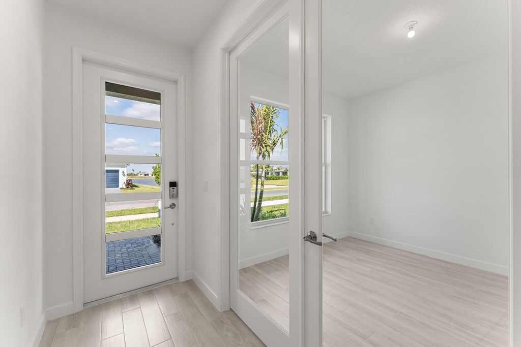 Photo of 13445 SW Bally Drive, Port Saint Lucie, FL 34987 (MLS # R11089990)