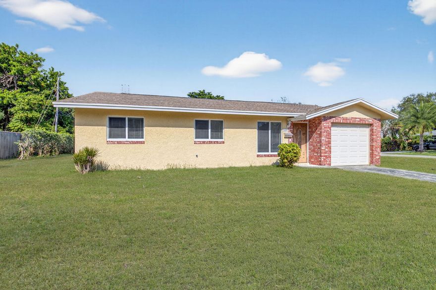 Now offered at $595,000, a great opportunity to own a home in East Boca's desirable Country Club Village with no HOA. Set on an oversized 9,000+ sq ft corner lot, this 3BR/2BA home offers the location buyers are looking for—move in and enjoy it now, then update over time to reflect your own style. Major improvements already in place include a 2024 roof, hurricane-impact windows, and a sliding glass door, adding valuable peace of mind. The property also features an attached garage, space for multiple vehicles in the driveway, and a spacious backyard with room for a pool or expanded outdoor living. With sidewalk-lined streets, street lighting, nearby Meadows Park, and zoning for A-rated Addison Mizner K-8, Boca Raton Community Middle School, and Boca Raton Community High School. Close proximity to I-95, FAU, Boca Regional, Town Center, Mizner Park, Brightline, and the beach just over 3 miles away, this home offers an increasingly hard-to-find combination of lot size, location, and long-term potential in East Boca.