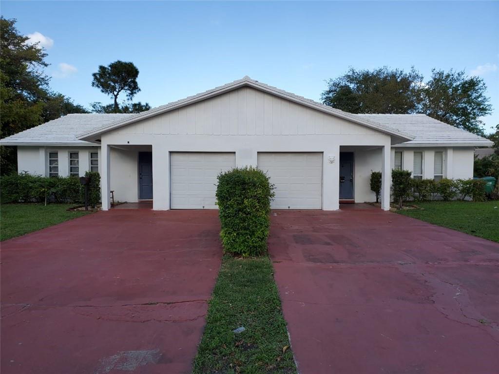 Beautifully updated duplex with attached garage available now! This spacious unit features a modern kitchen, renovated bathrooms, and updated flooring throughout. Enjoy a screened patio overlooking a large backyard with serene canal views and no rear neighbors.
