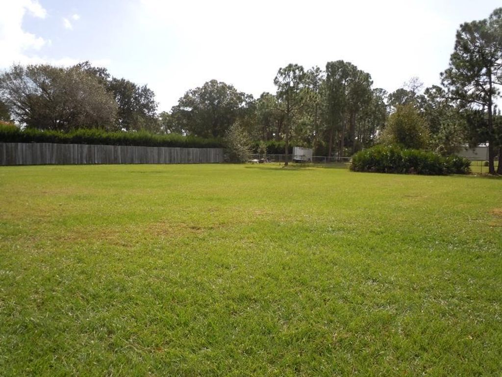 Photo of 6008 Palmetto Drive, Fort Pierce, FL 34982 (MLS # B26017582)