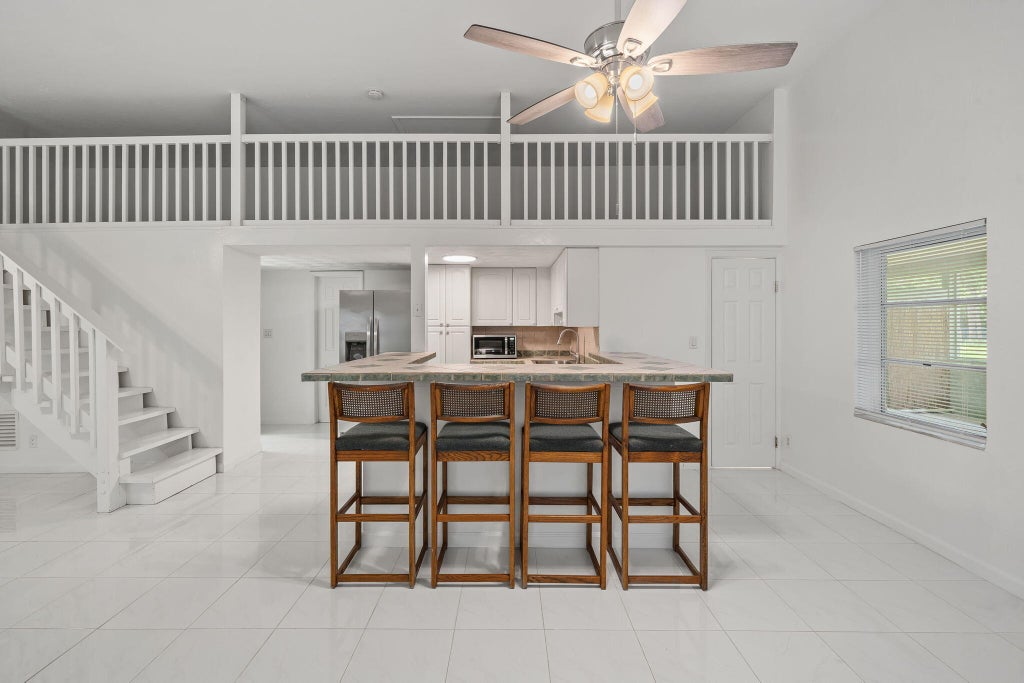 Photo of 2585 W G Road, Loxahatchee Groves, FL 33470 (MLS # B26071237)