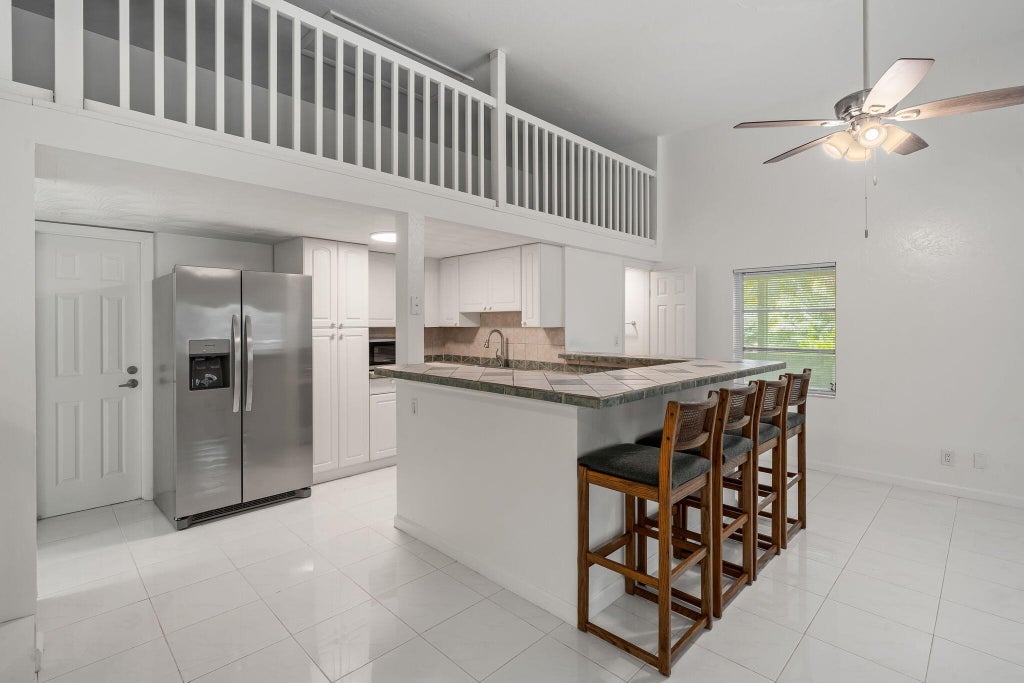 Photo of 2585 W G Road, Loxahatchee Groves, FL 33470 (MLS # B26071237)