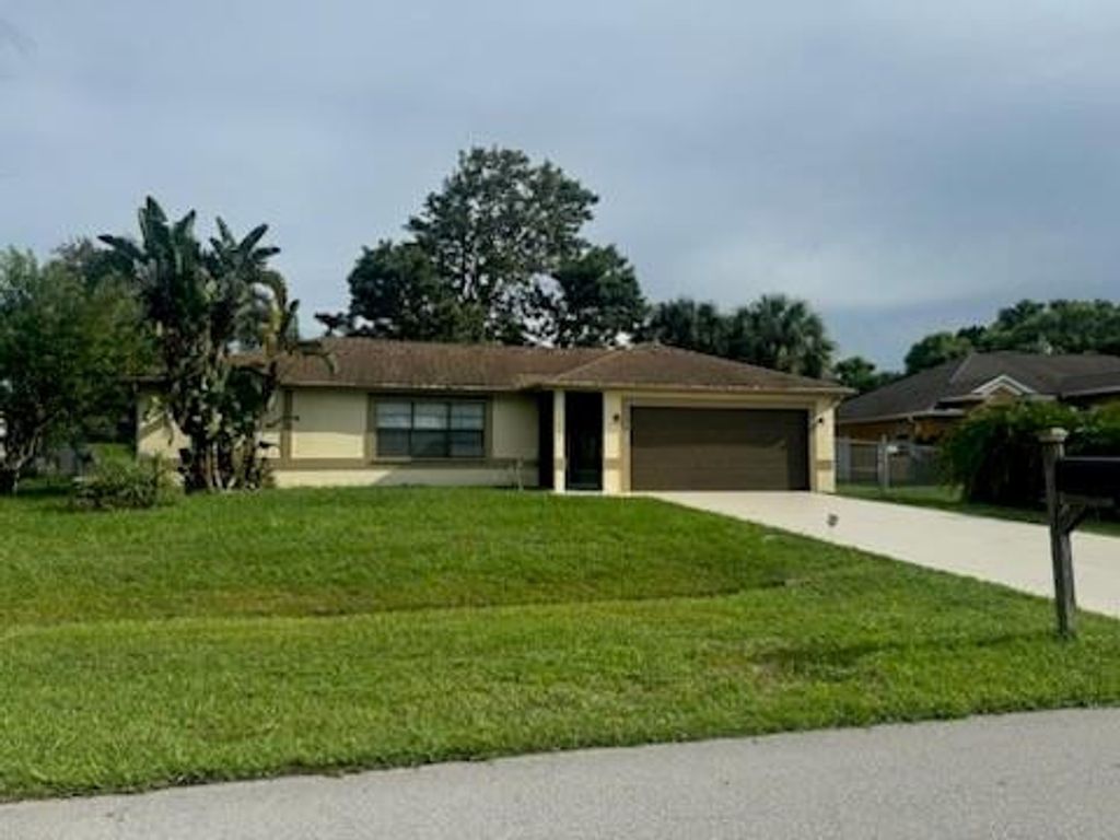 Photo of 1974 SE Lavina Circle, Port Saint Lucie, FL 34952 (MLS # F10458860)