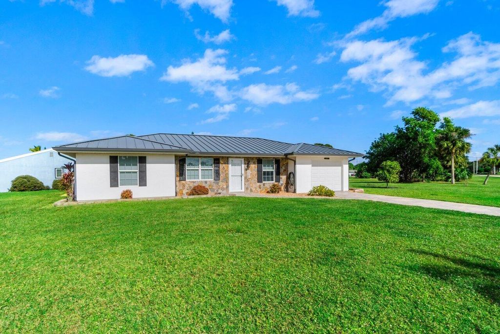 Photo of 1697 SE Lyngate Drive, Port Saint Lucie, FL 34952 (MLS # R11064819)