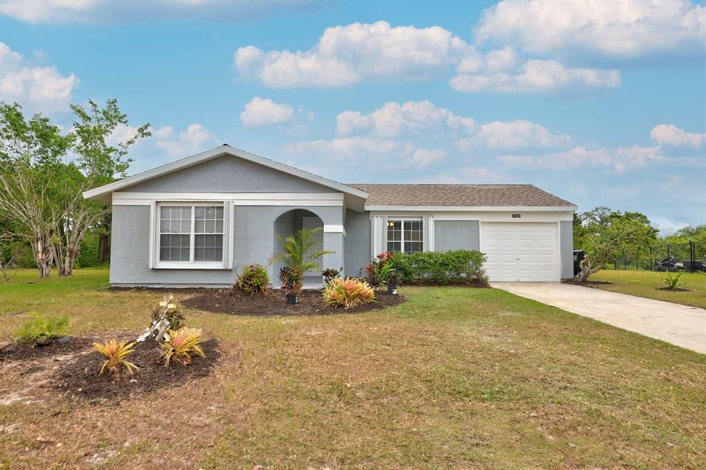 Photo of 1633 SE Burgundy Lane, Port St Lucie, FL 34952 (MLS # R10874151)