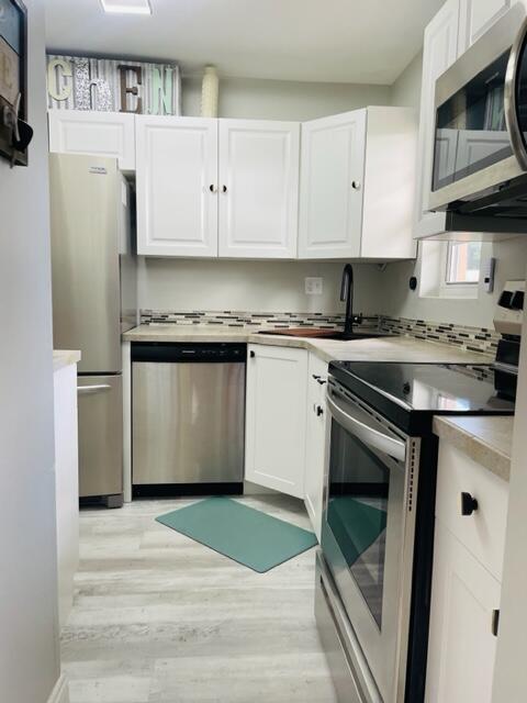 Photo of 1921 SW Palm City Road #A, Stuart, FL 34994 (MLS # R10910689)