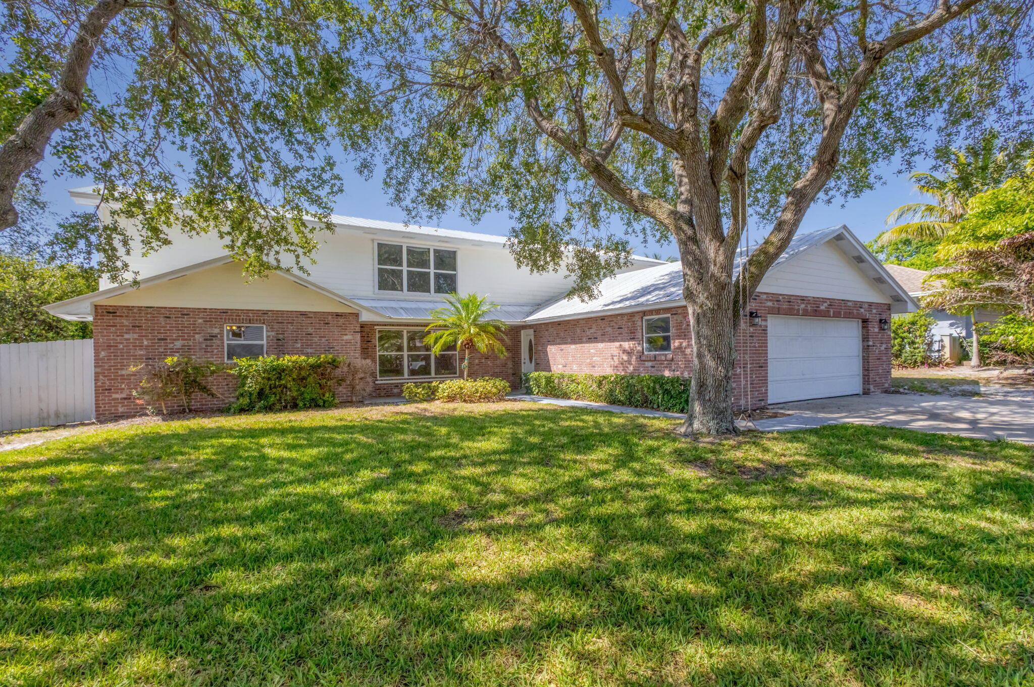Need space? This giant house is 6 bedrooms and 3 1/2 baths, 2 car garage and a huge, fenced backyard. Located off Gomez in Hobe Sound, you can't ask for a better spot.