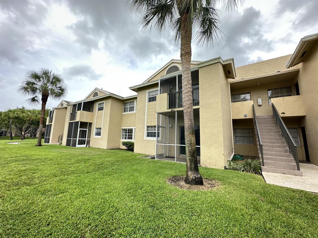 Photo of 800 Cypress Park Way #M, Pompano Beach, FL 33064 (MLS # B26042342)