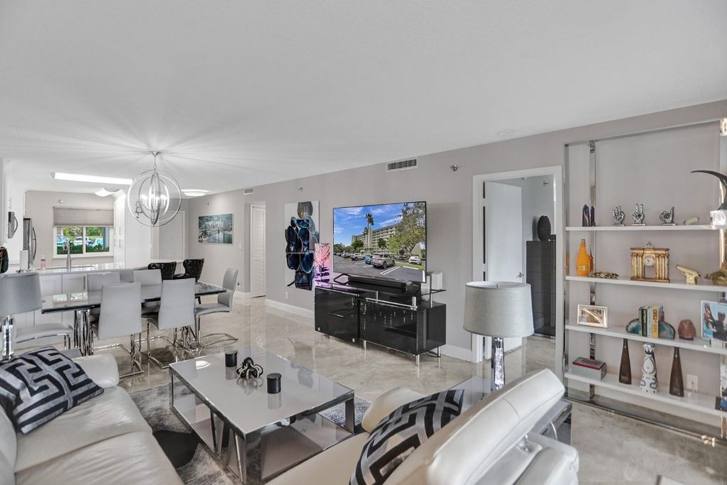 Photo of 2238 N Cypress Bend Drive #105, Pompano Beach, FL 33069 (MLS # F10459468)