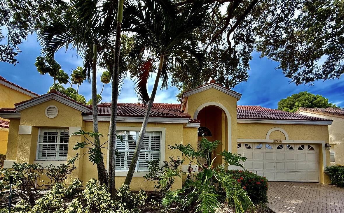 Welcome to 10148 Aspen Way, where style meets substance in one of Palm Beach Gardens' most desirable communities. This single-story stunner offers 3 bedrooms, 2 full bathrooms, soaring ceilings, and a serene garden view that instantly sets the tone. Sitting on a quiet street and zoned for Top-Rated Schools, the home features a Brand-New Roof and AC - a major win for today's savvy buyer. Inside, you'll find pristine, high-end carpeting (only a year old), a layout that flows, and endless potential. Enjoy effortless living with resort-style amenities, and you're just minutes from premier shopping, dining, and world-class beaches. Opportunities like this don't come often. Make it yours!