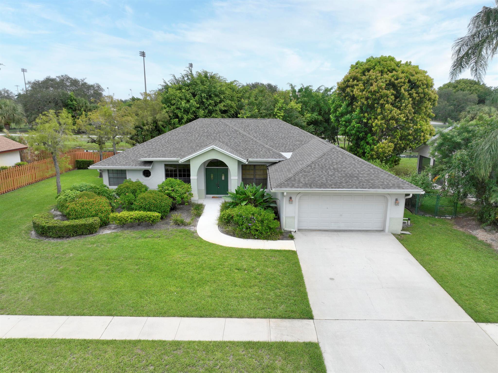 VACANT ESTATE SALE ON THE CANAL NO POOL LARGE SCREENED PATIO, NEXT TO WELLINGTON HIGH SCHOOL,4 BEDROOMS 2.5 BATHS,NEW ROOF INSTALLED,LARGE YARD GREAT NEIGHBORHOOD,HOME IS GREAT FOR FAMILIES OR FOR ENTERTAINING GUESTS,NO HOA FEES,