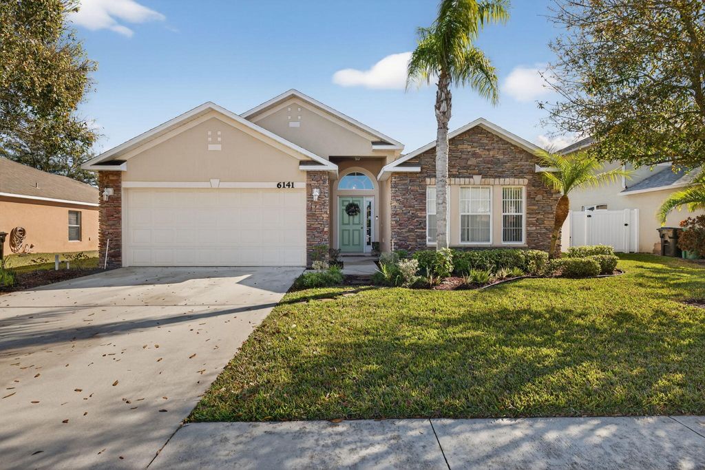 Photo of 6141 NW Wild Cotton Way, Port Saint Lucie, FL 34986 (MLS # R11157532)