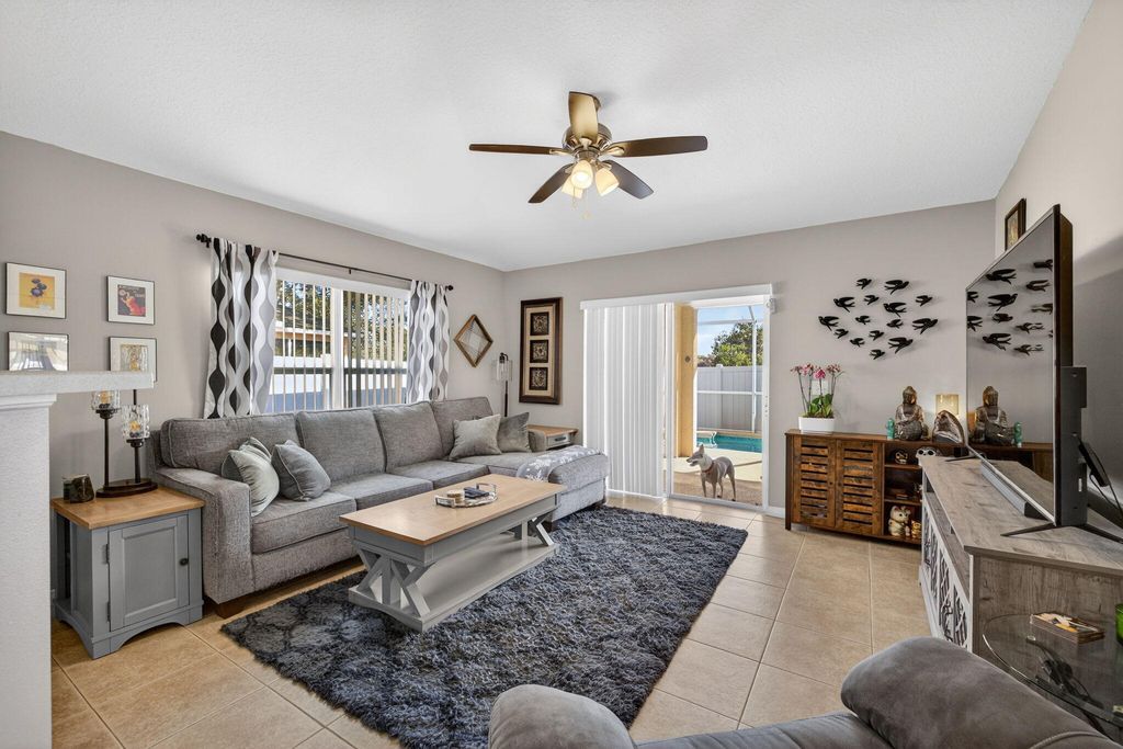 Photo of 6141 NW Wild Cotton Way, Port Saint Lucie, FL 34986 (MLS # R11157532)