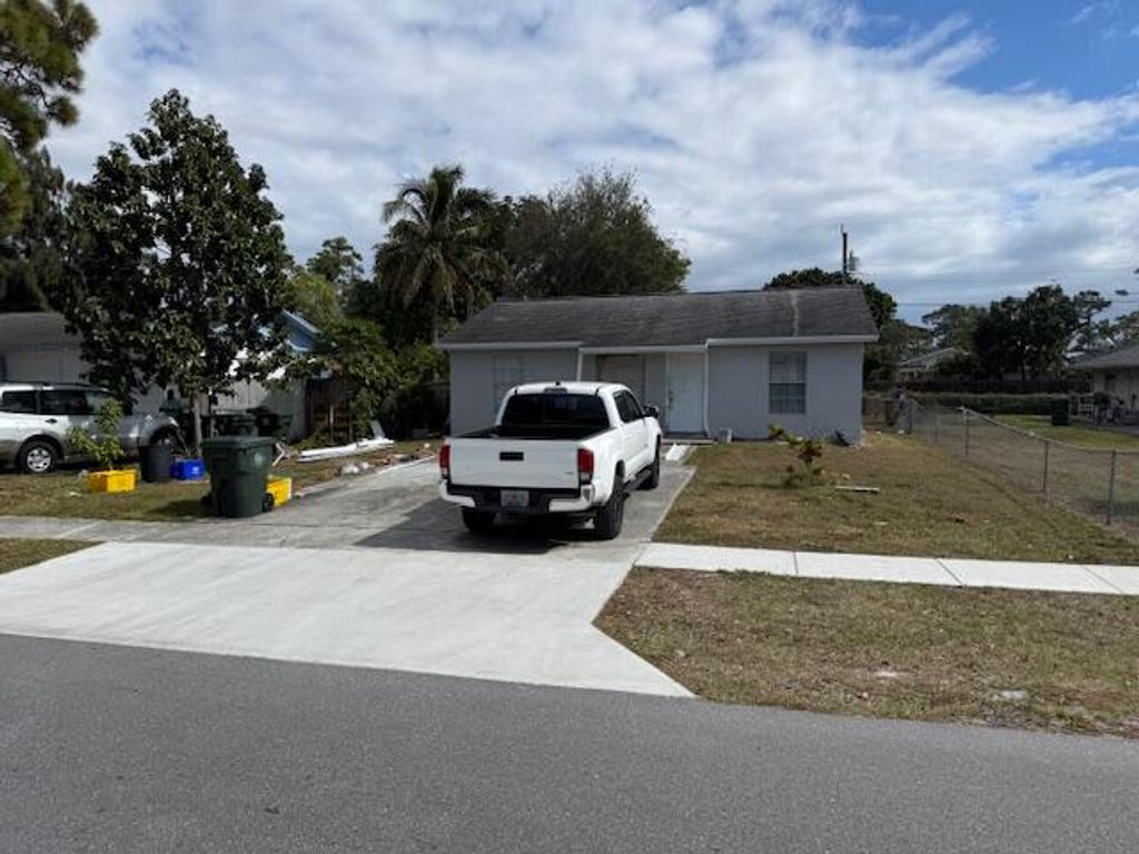 Photo of 448 Perry Avenue, Greenacres, FL 33463 (MLS # R11160724)