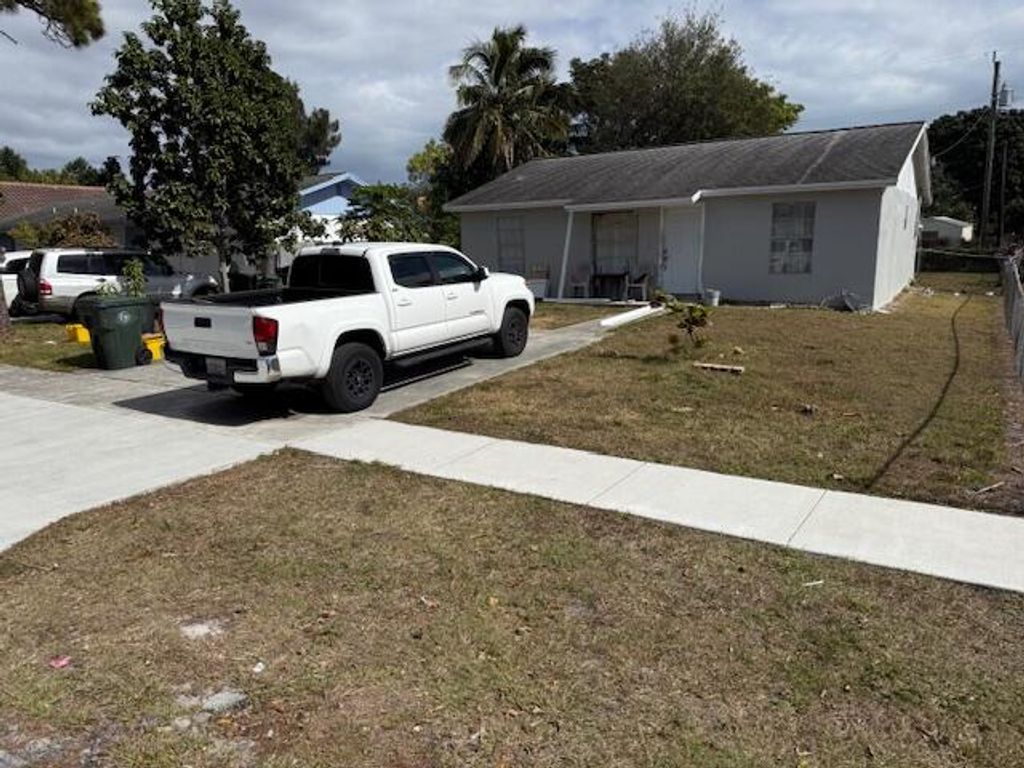 Photo of 448 Perry Avenue, Greenacres, FL 33463 (MLS # R11160724)