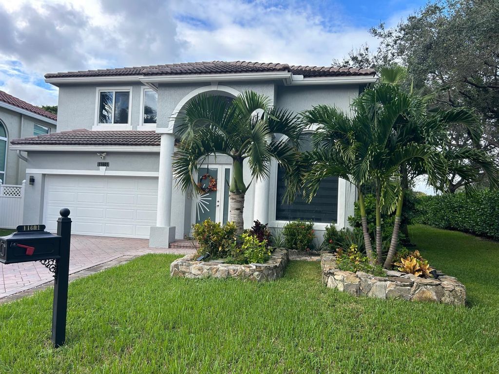 Photo of 11601 NW 13th Manor, Coral Springs, FL 33071 (MLS # F10551372)