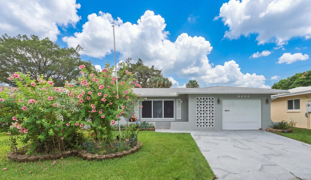 Photo of 4404 NW 45TH Court, Tamarac, FL 33319 (MLS # B26091061)